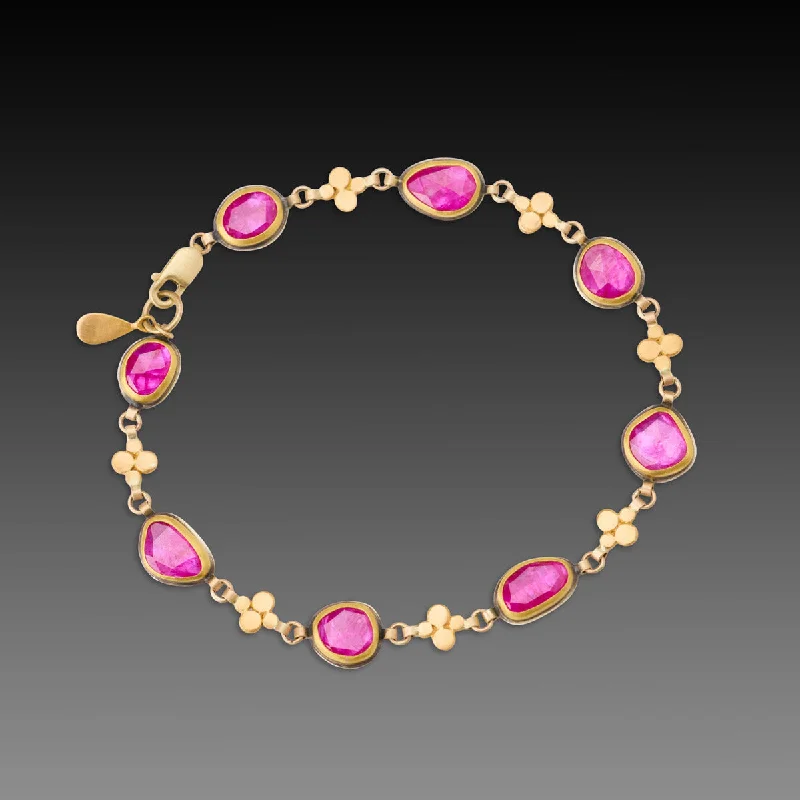 silver bracelet with heart-shaped gemstone for love energy-Ruby and Gold Linked Bracelet