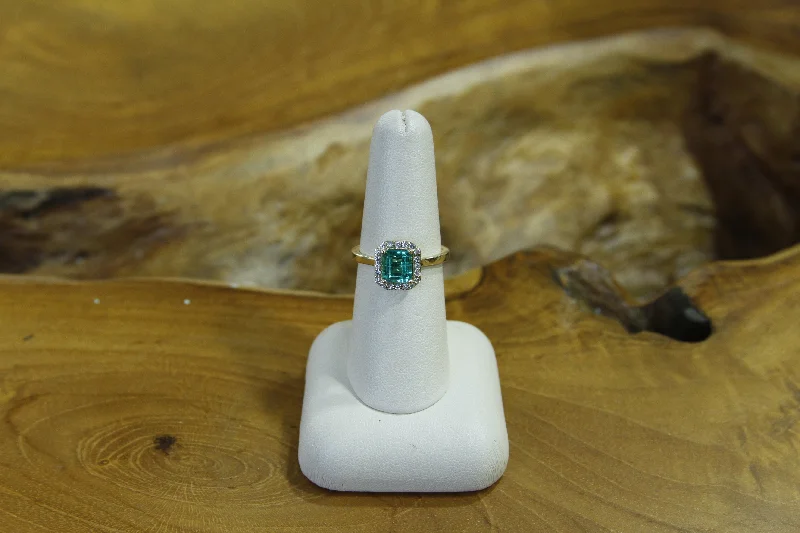 custom wedding bands with sapphires and diamonds for women-Emerald with Diamond Halo Ring